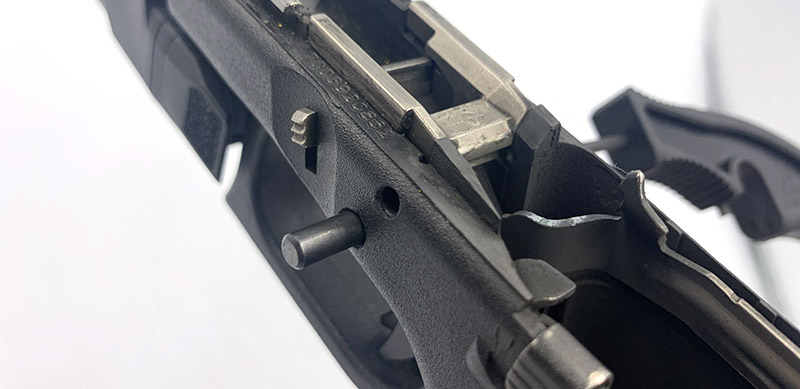 pushing out Glock trigger pin